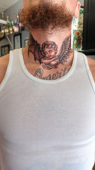 Arm tattoo with checkered flags, 