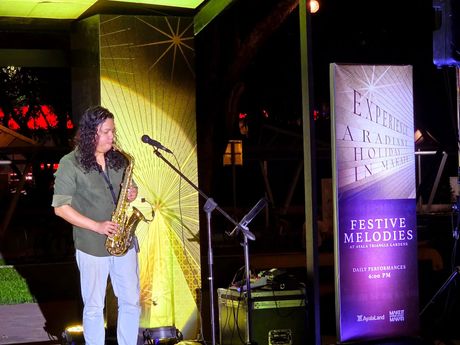 Live saxophone performance at Festive Melodies evening entertainment near Makati hotel