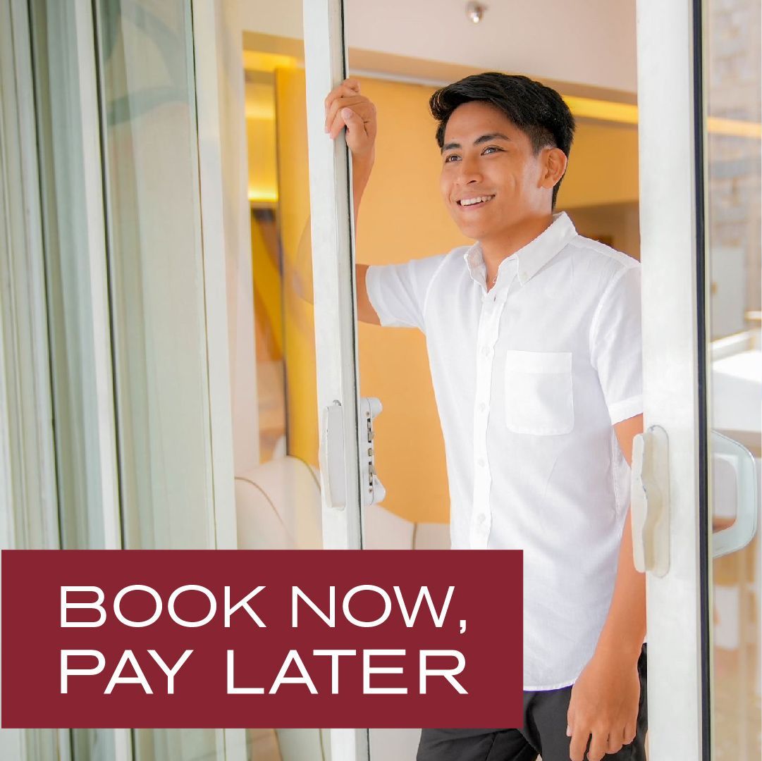 Man in white shirt smiling, opening a door; text 