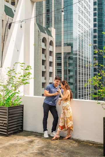 Rooftop views from Picasso Makati hotel with intimate couple setting and city backdrop