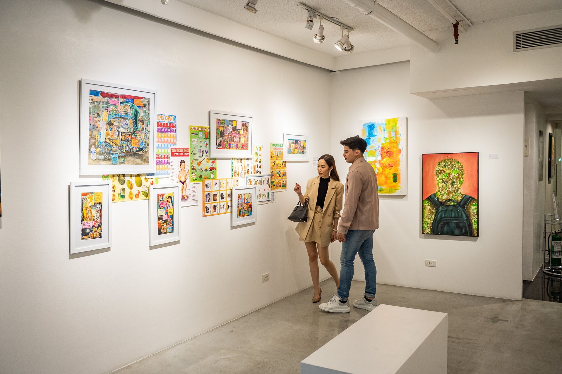 Couple appreciating art at The Picasso Boutique Serviced Residences