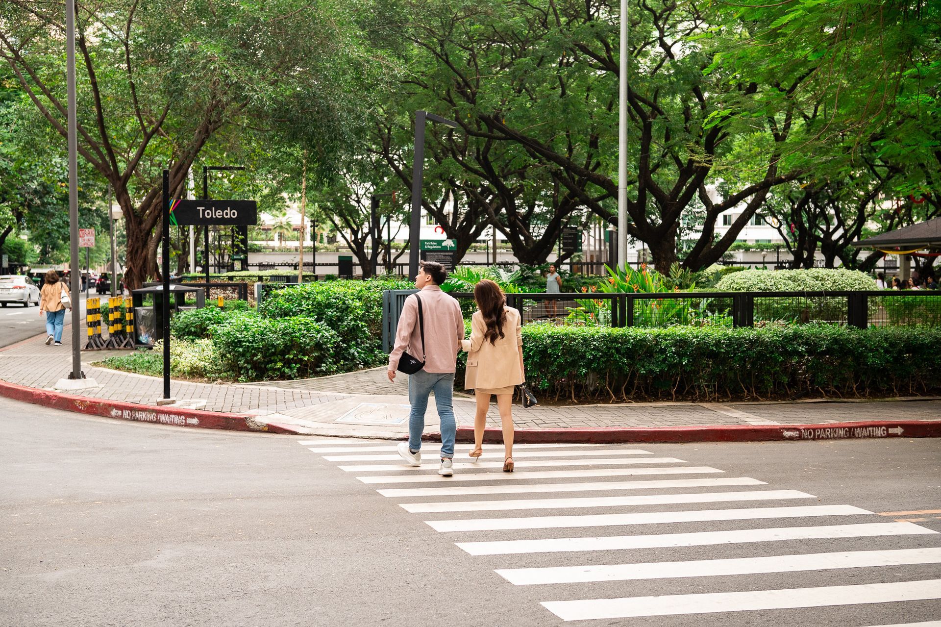 Couple walking around the vicinity of The Picasso Boutique Serviced Residences.