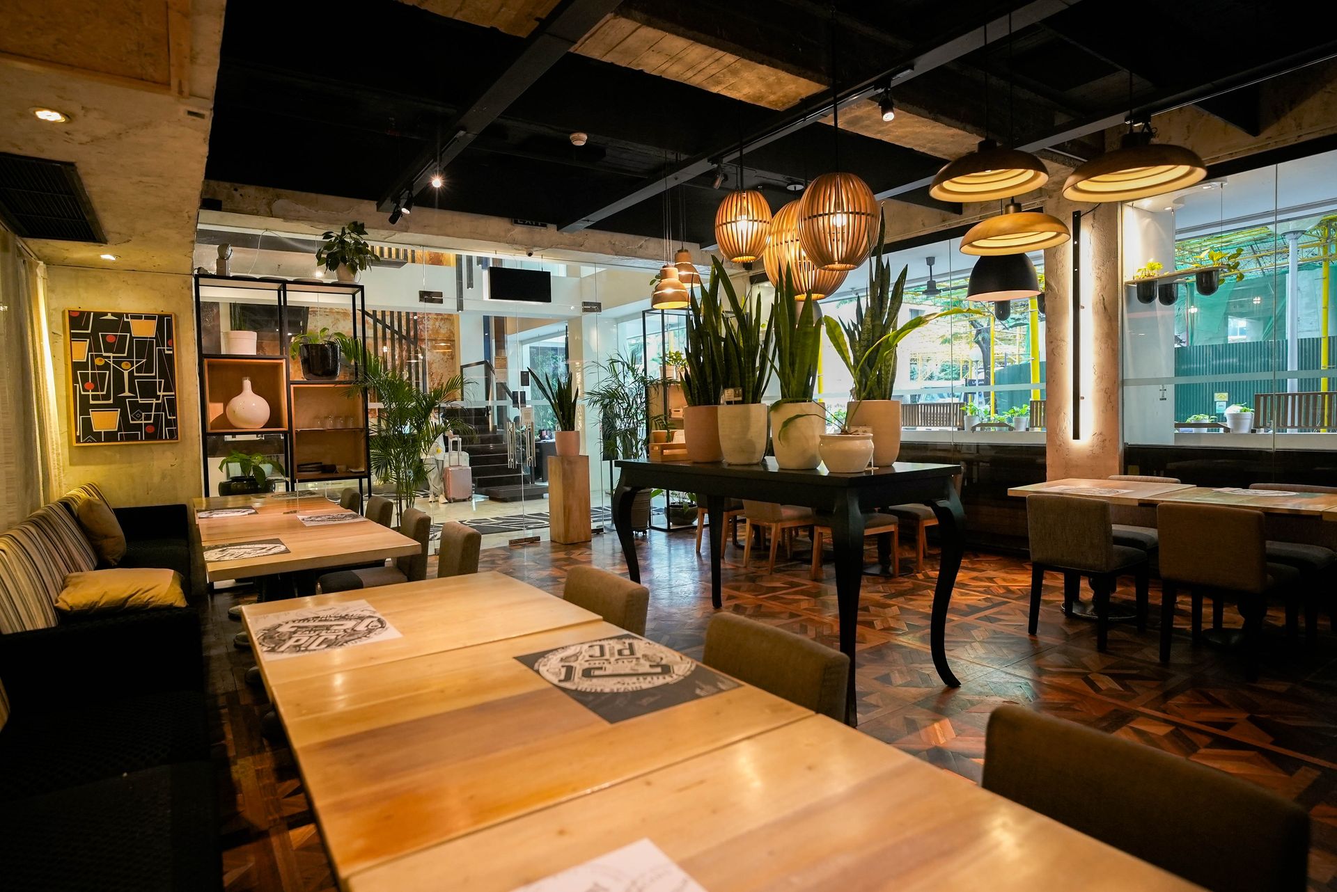 The elegant interior of a fine dining restaurant, showcasing the upscale dining scene easily accessible from hotels near Greenhills.
