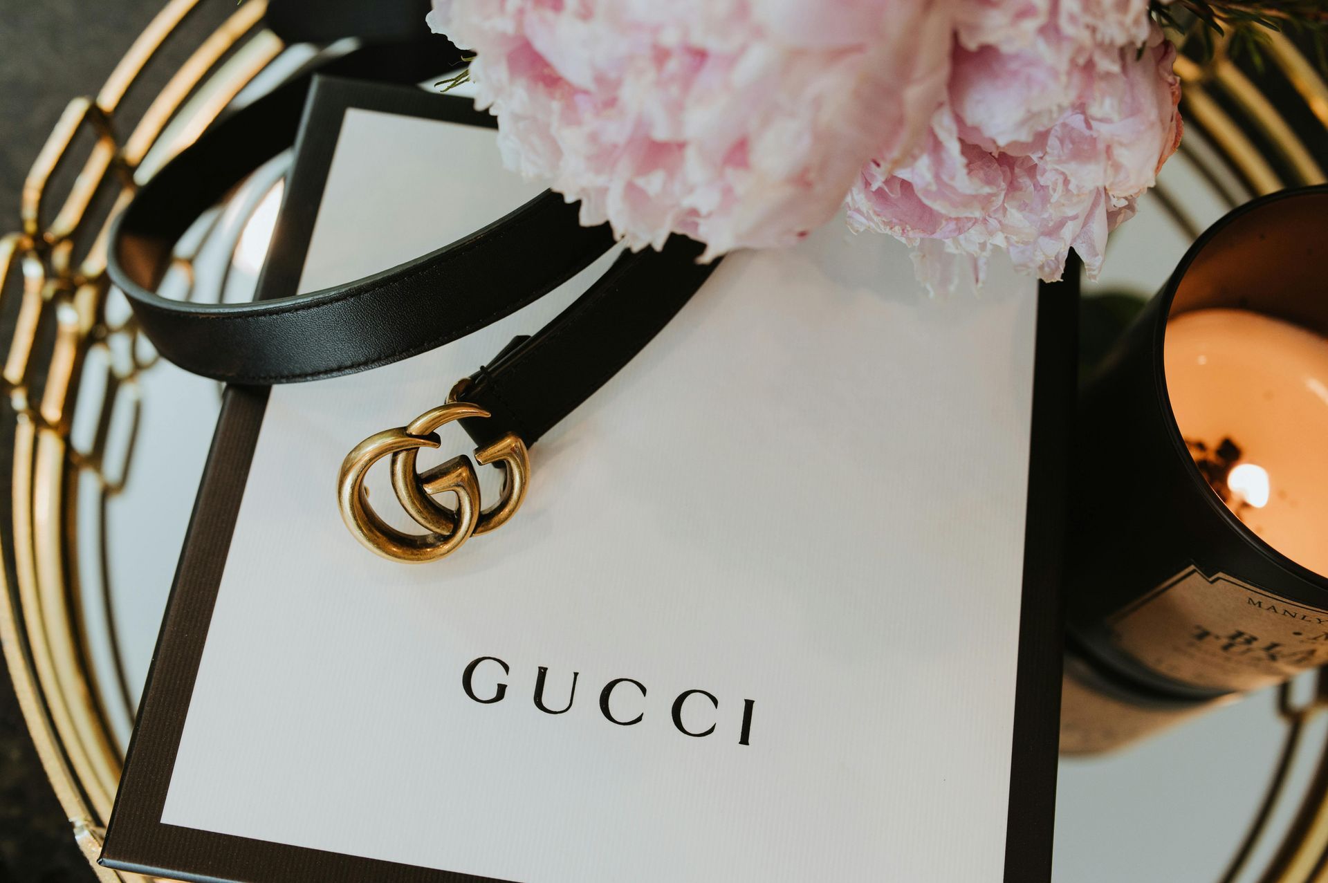 A luxury designer handbag representing the international brands like Gucci and Prada available at Greenbelt, a short walk from hotels near Greenbelt.