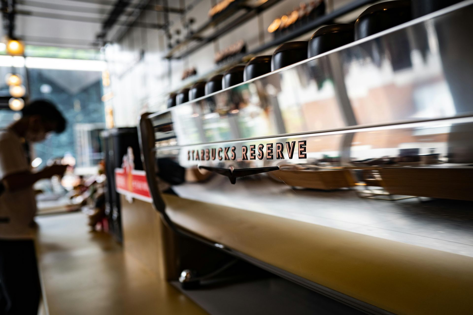 The stylish interior of an artisanal coffee shop, one of the many cafes just a short walk from hotels near Greenbelt.