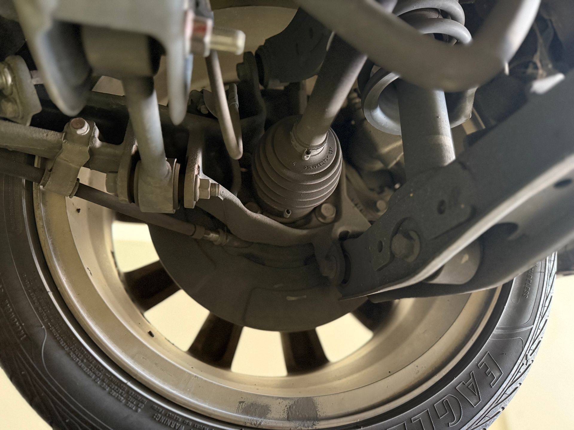 Person in Car Filling Out a Form on a Clipboard With a Blue Pen — QA Oxley in Oxley, QLD