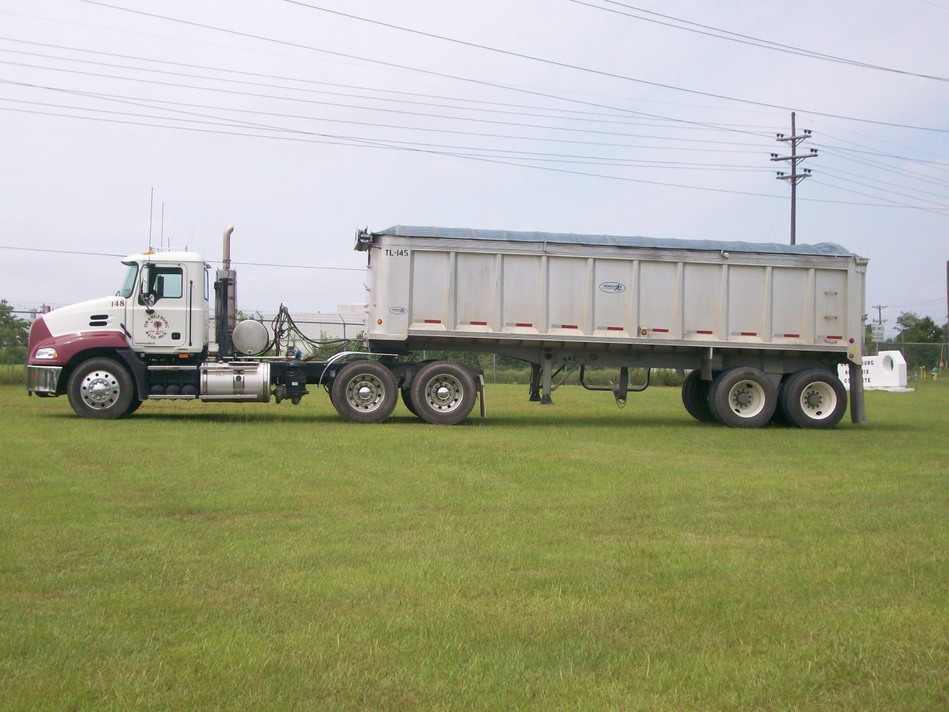 A White Cement Mixer Truck — Orangeburg, SC — Orangeburg Redi-Mix Concrete, Inc.