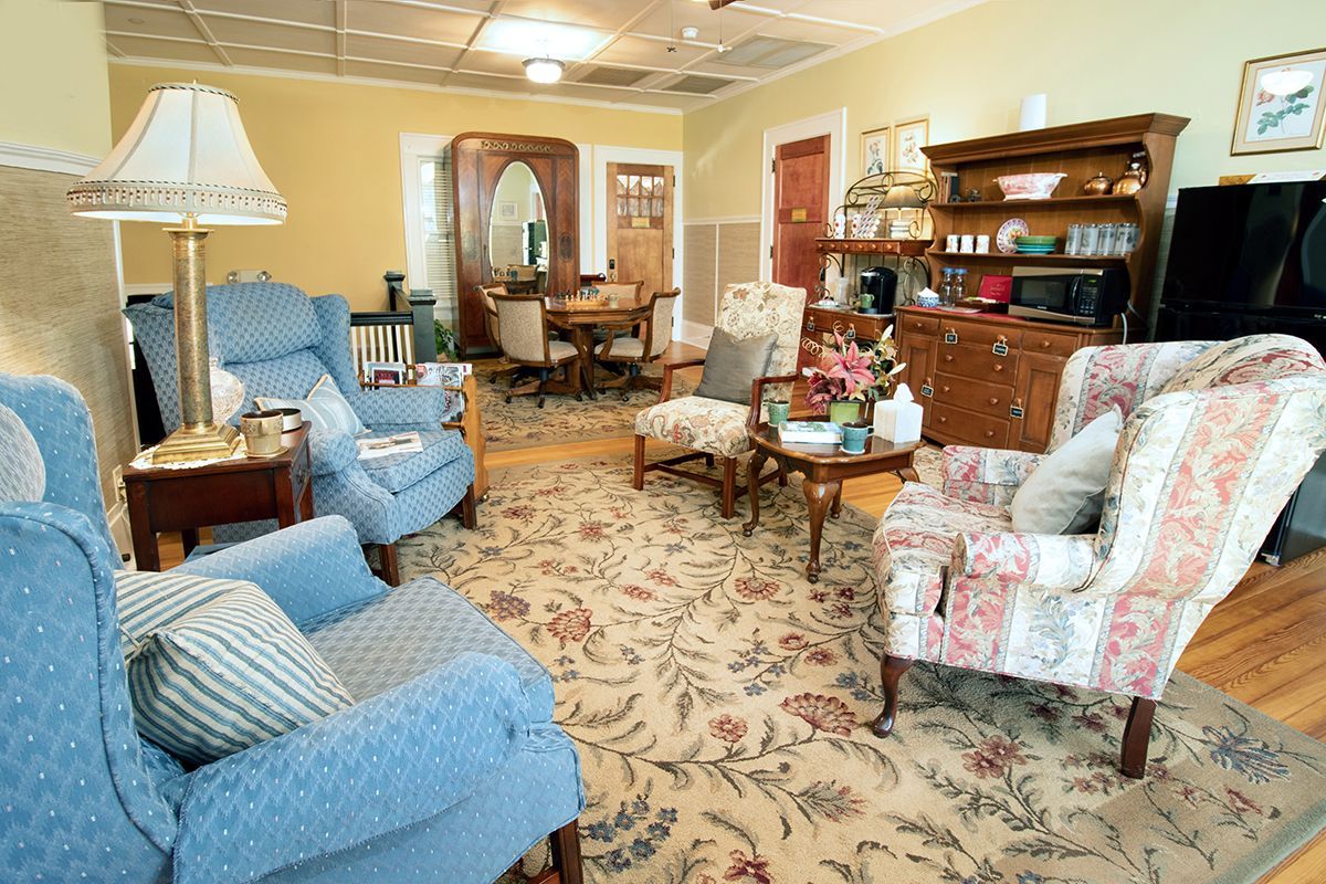 View of upstairs common area showing seating areas and refreshment bar