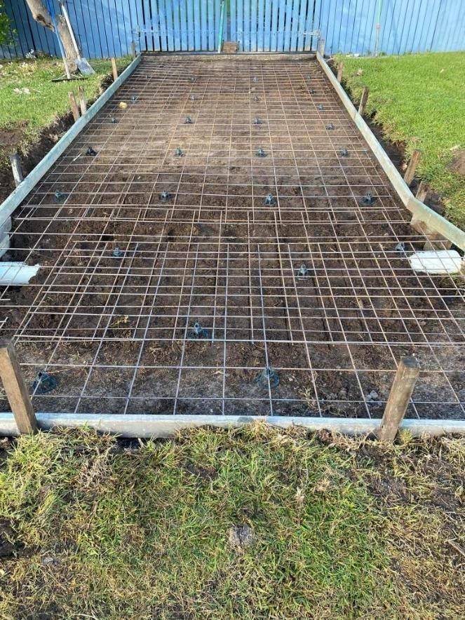 Concrete Foundation Form With Rebar Grid and Wooden Stakes — BJ's Concreting in Sanctuary Point, NSW