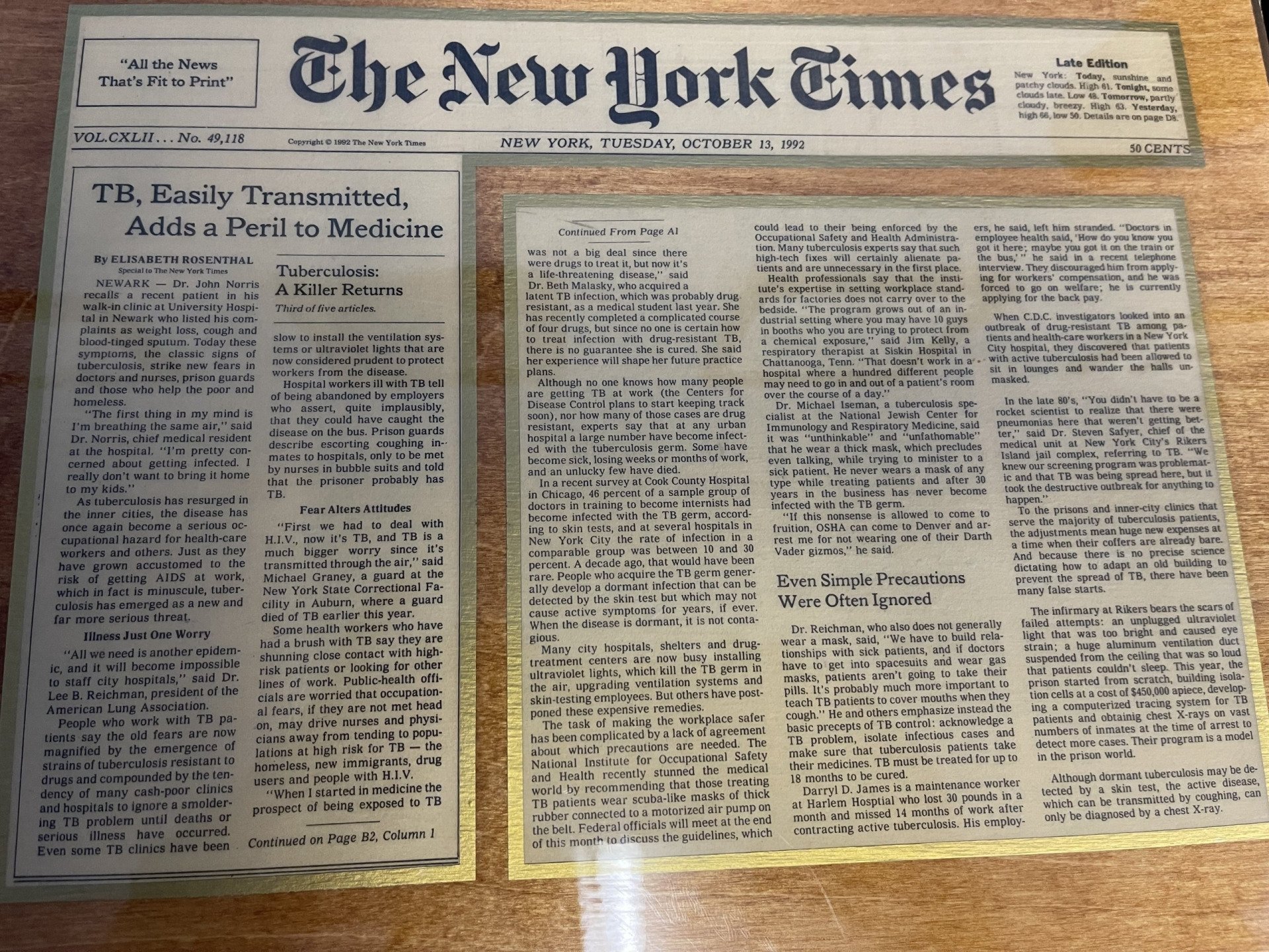 The New York Times newspaper pages, showcasing text columns with headlines and articles, in shades of black and white.