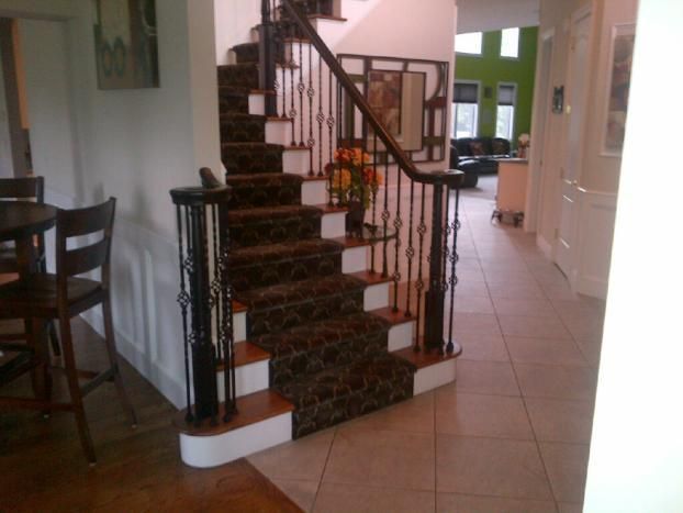 A staircase leading up to the second floor of a house