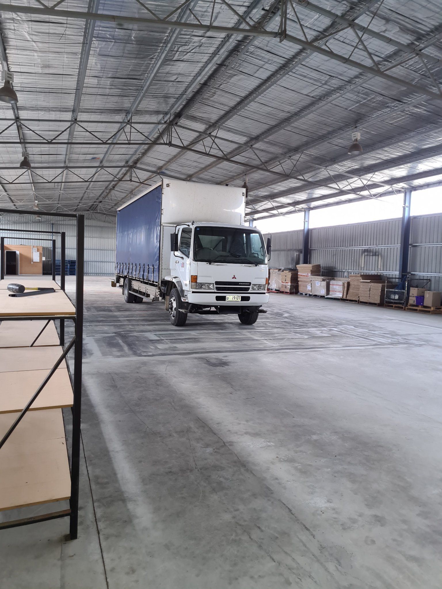 Venture Logistical | White Truck Parked Inside the Business Warehouse Ready for Pick-up | Bridgewater TAS