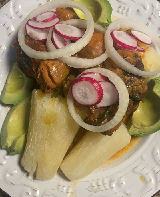 A plate of food with onions and radishes on it