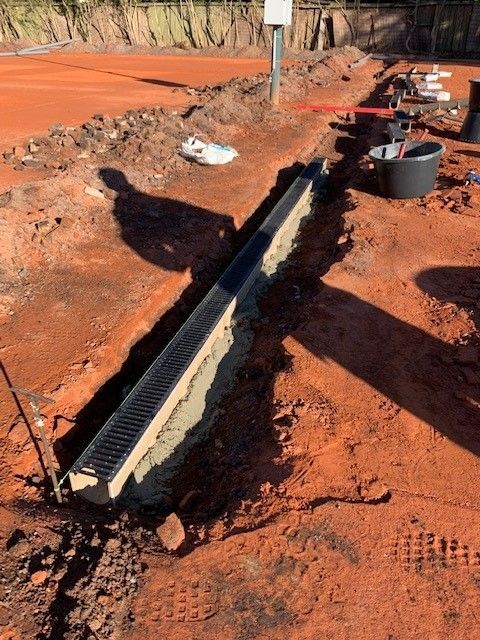 Tennisvereniging Melkhuisje, tennisbaan, afwatering, lijngoten, gravel, riolering