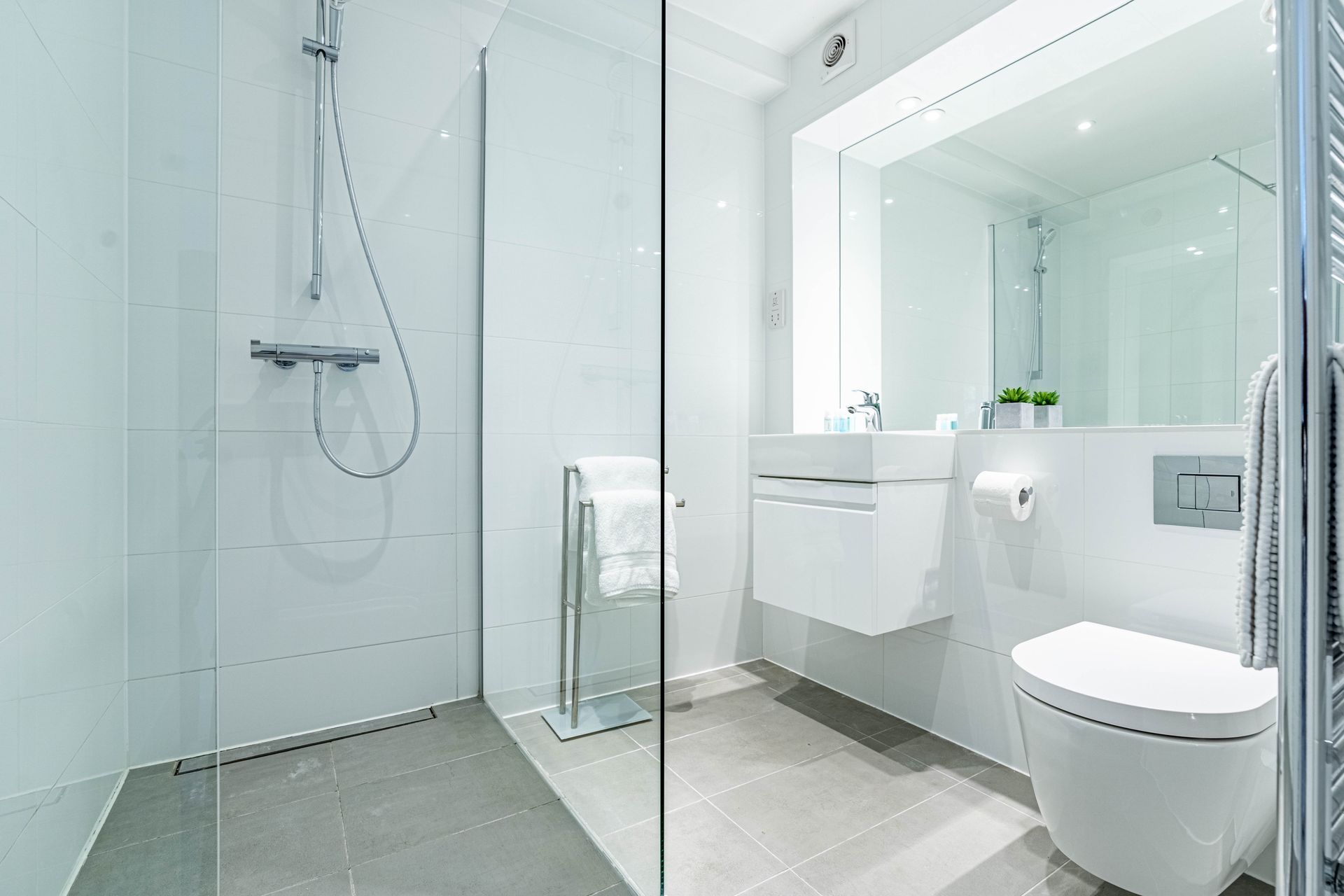 faculty bathroom with walk in shower celador apartments