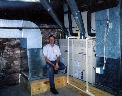 Man Sitting — Terrell, TX — System Control Air Conditioning & Heating