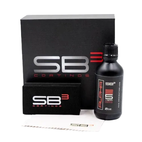 A bottle of sb3 coatings sits next to a box
