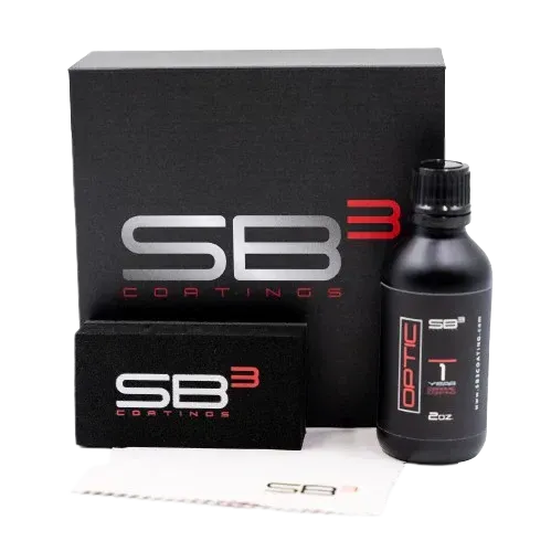 A bottle of sb3 coatings sits next to a box