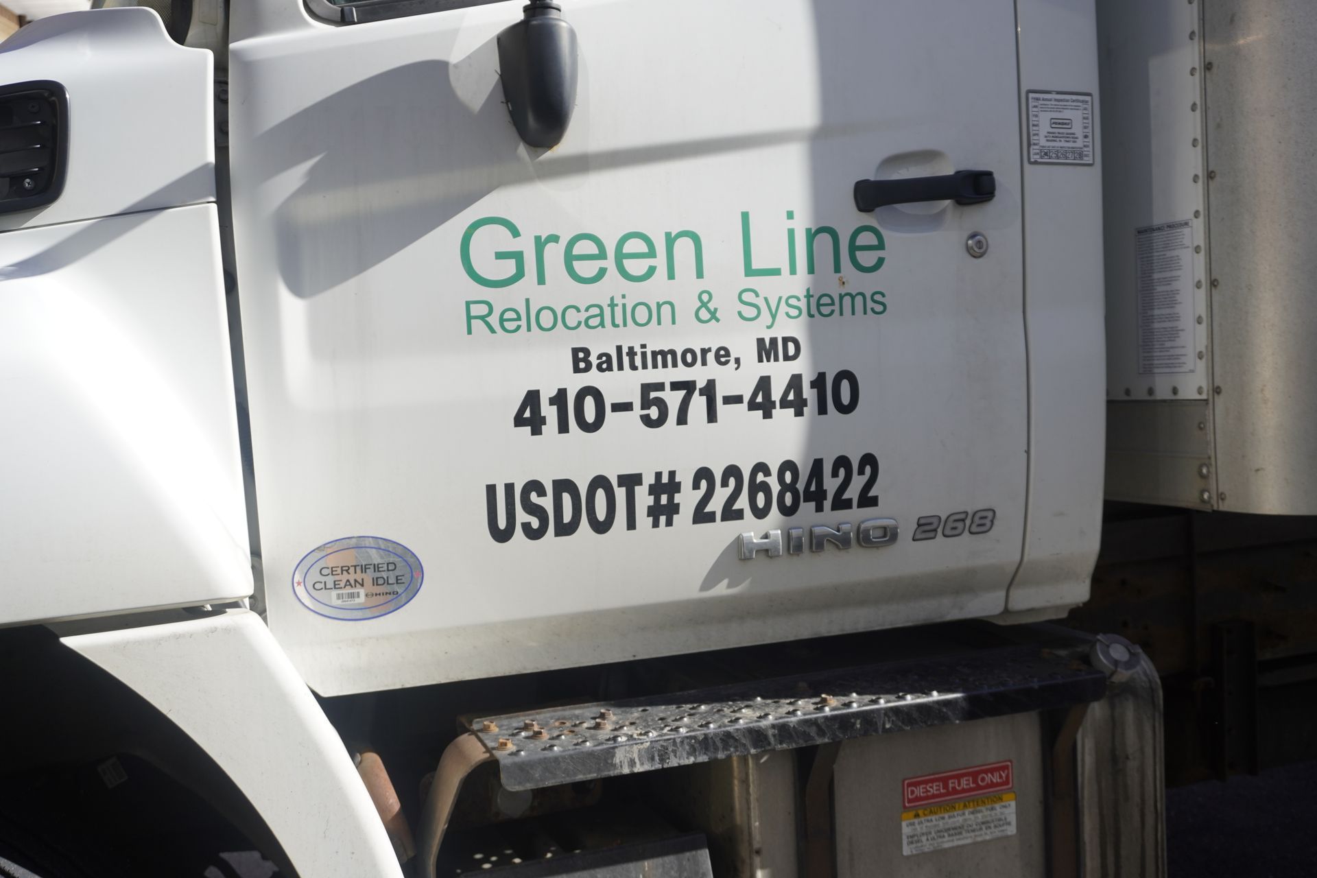 Side view of a white truck door with 