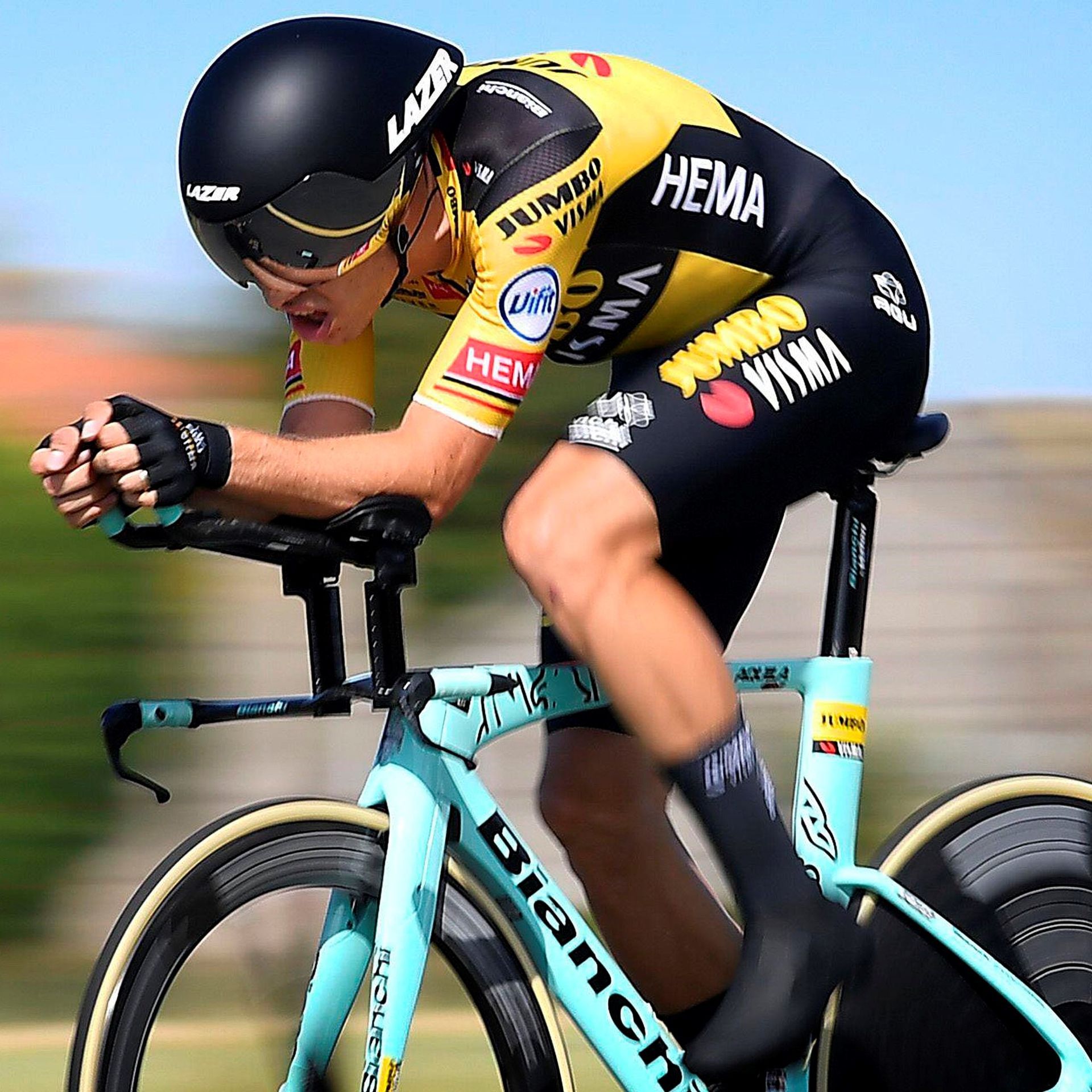 A Man Riding A Bike With The Word Hema On His Jersey — Trinity Cycle Works In Cairns City, QLD