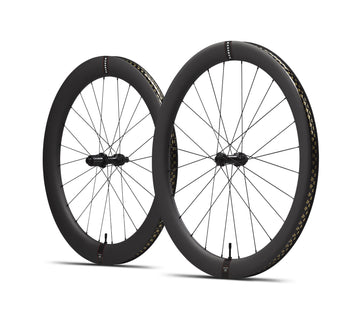 A Pair Of Black Bicycle Wheels On A White Background — Trinity Cycle Works In Cairns City, QLD