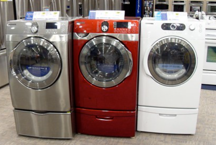 picture of three washers dryers