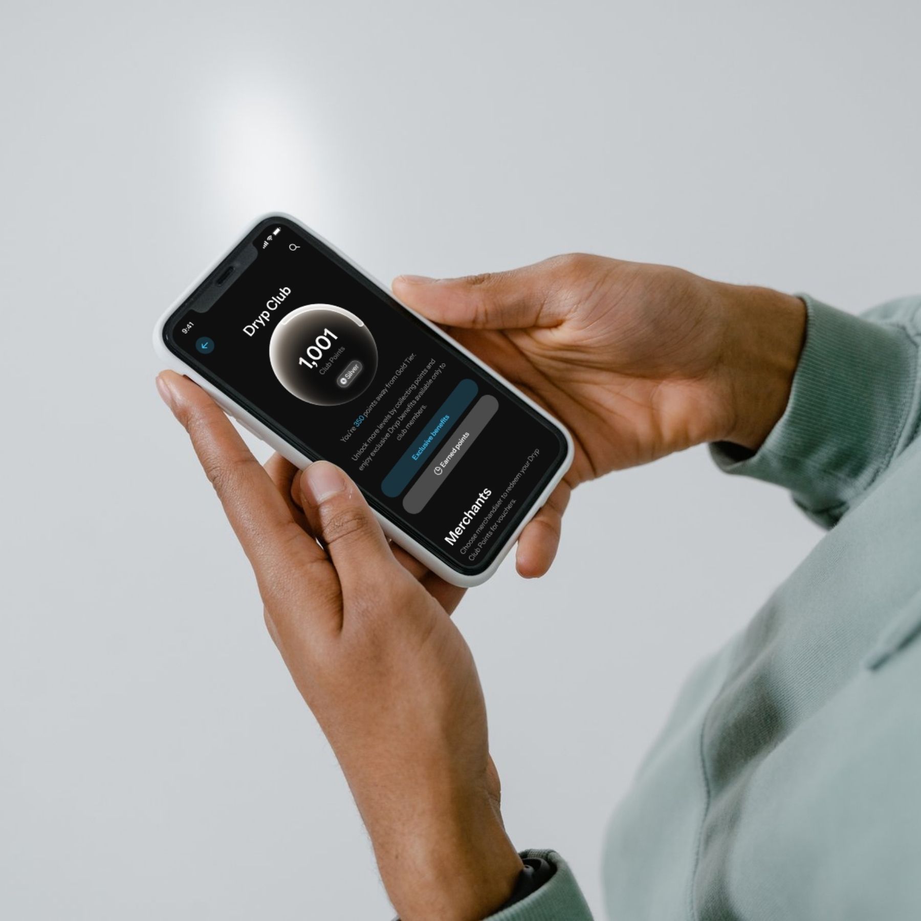 Person holding smartphone displaying a health app.