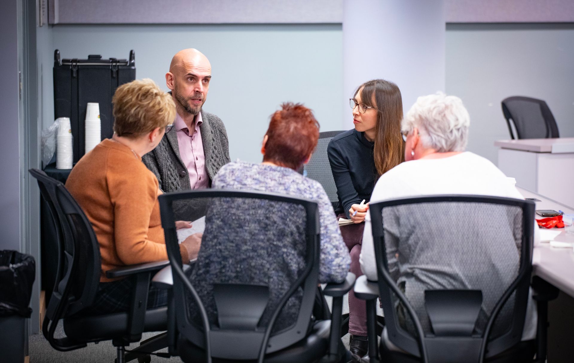 Staff and faculty sharing ideas during an APOP session