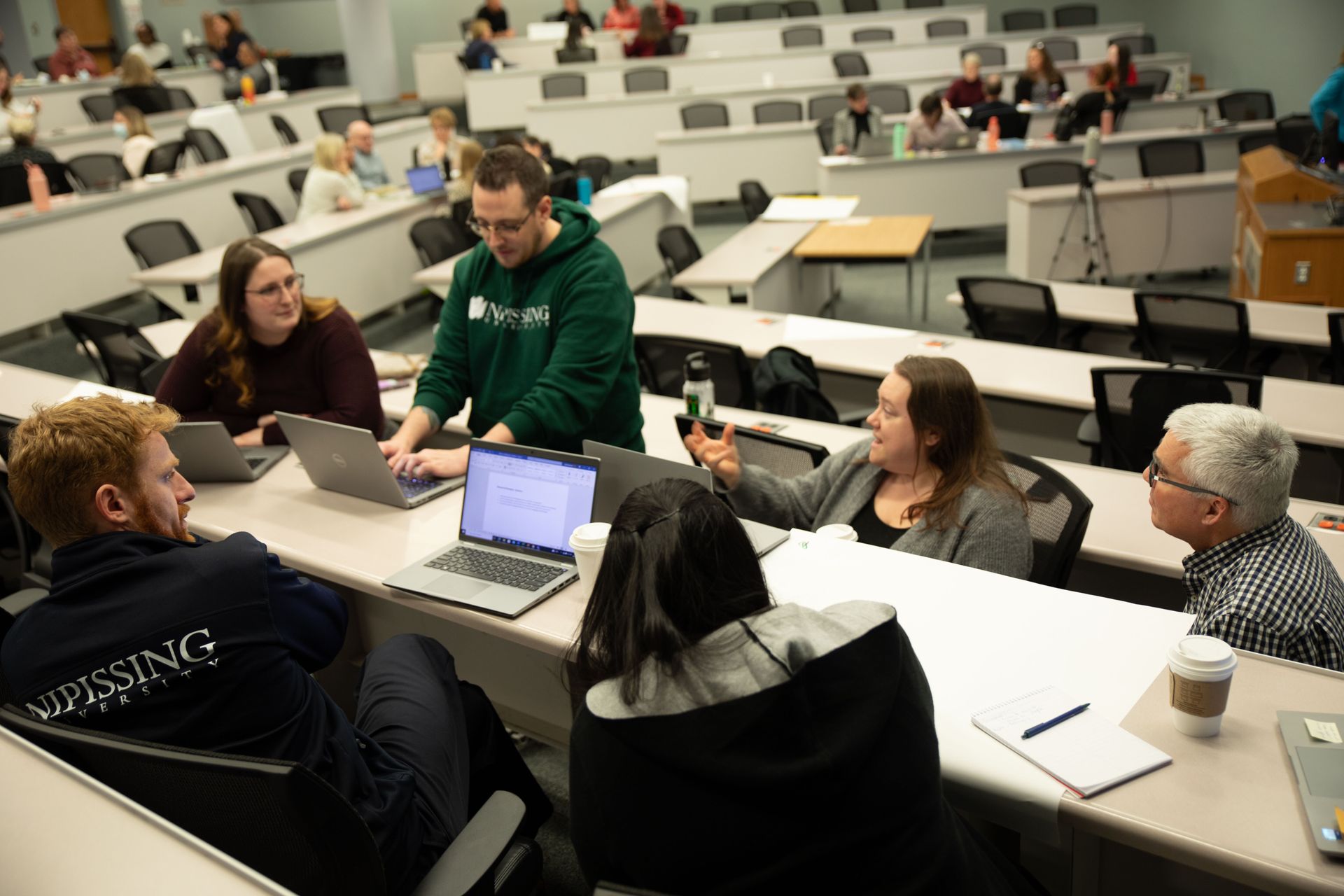 Staff and faculty sharing ideas during an APOP session