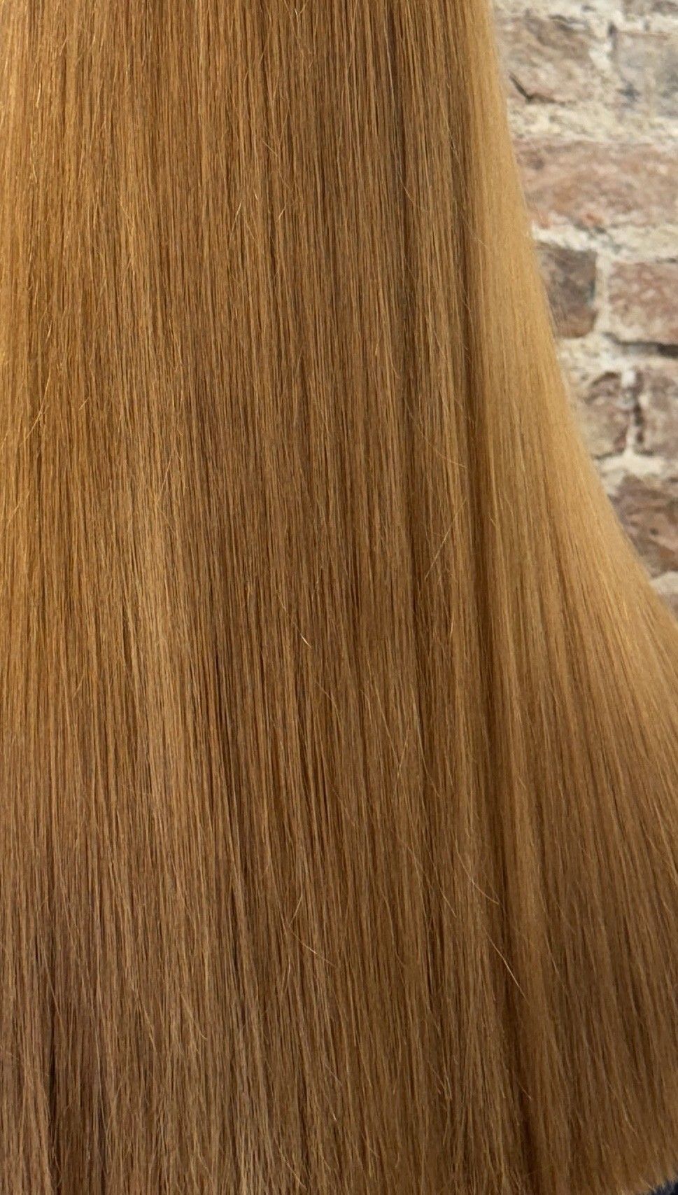 Hair colour correction result after black box dye removal with healthy copper tone