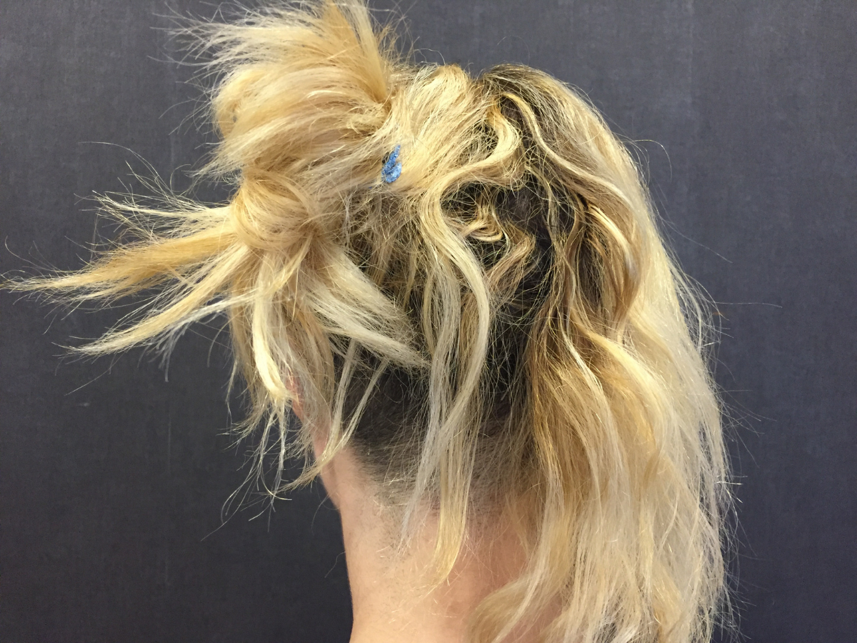 Uneven blonde hair with visible banding and patchy colour caused by inconsistent at-home box dye app