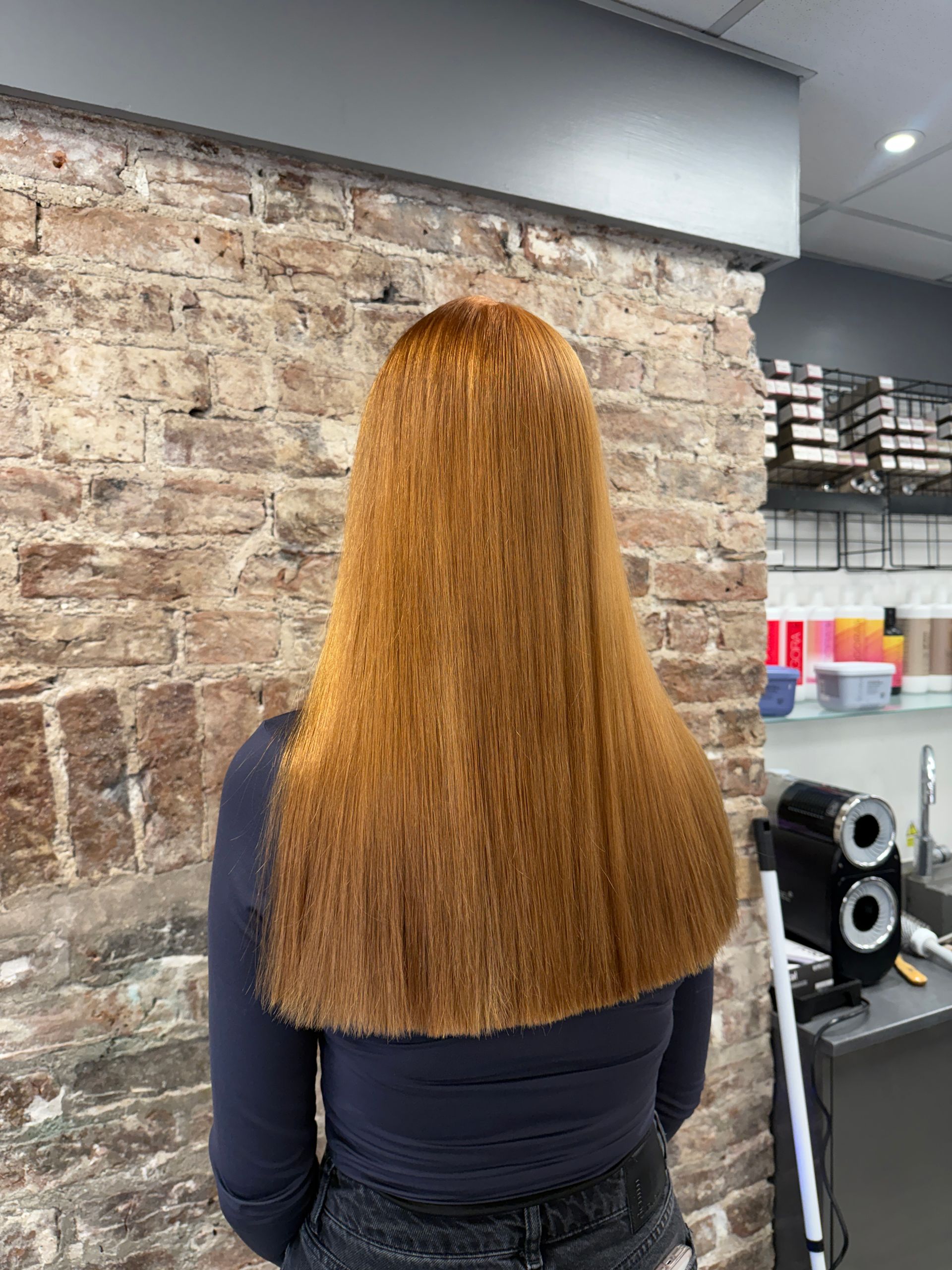 Copper hair colour result after colour correction with smooth, even finish