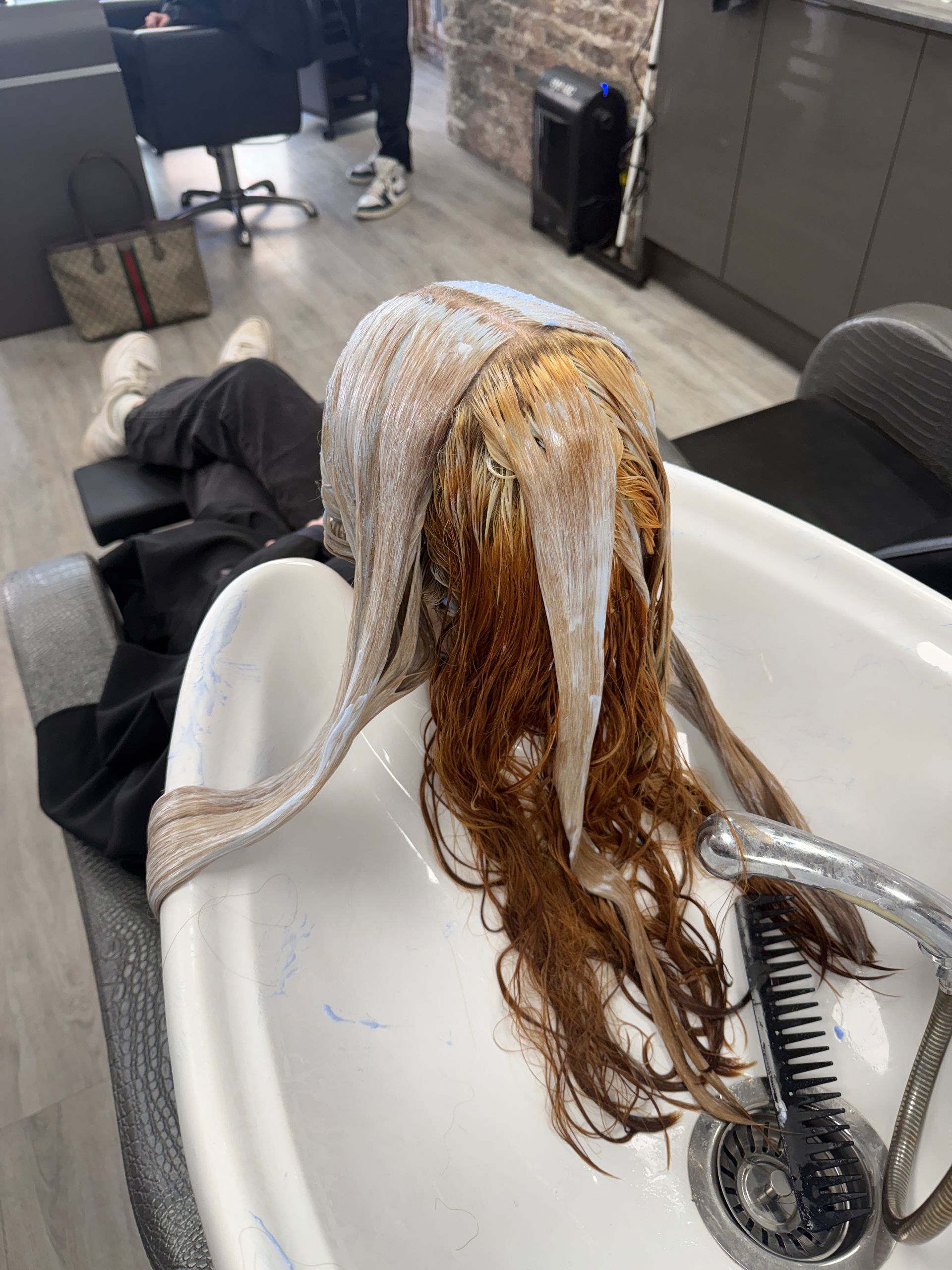 Black box dye removal during colour correction showing warm undertones after controlled lifting process