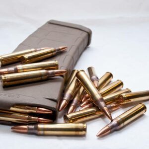 A bunch of bullets are spilling out of a magazine