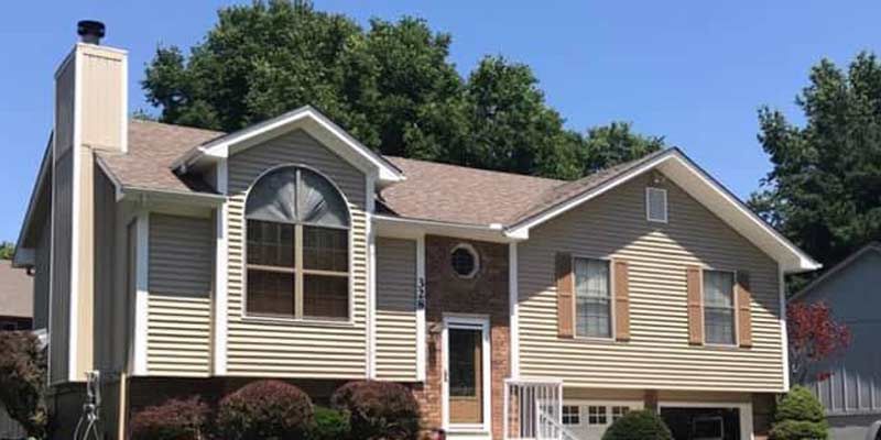 A large house with new roof and new siding