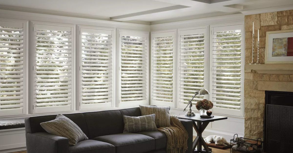 a closet filled with lots of blankets and pillows