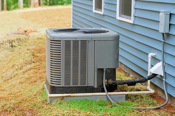 Air Conditioner Outside a New House — Cambridge, OH — RC Rogers Company LLC