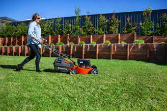 gardener using a mower