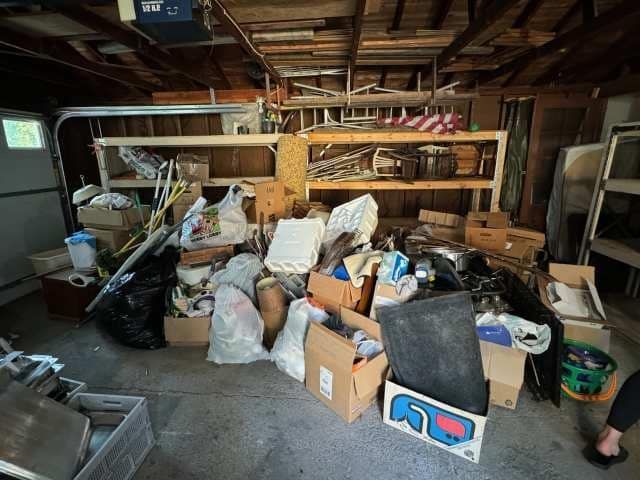 A garage filled with lots of boxes and bags.