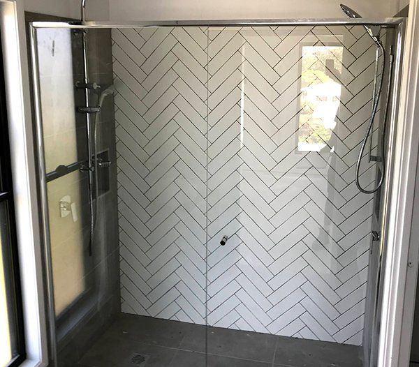 Bathroom Glass Door — Suncoast Shower & Security Screens in Marcoola, QLD