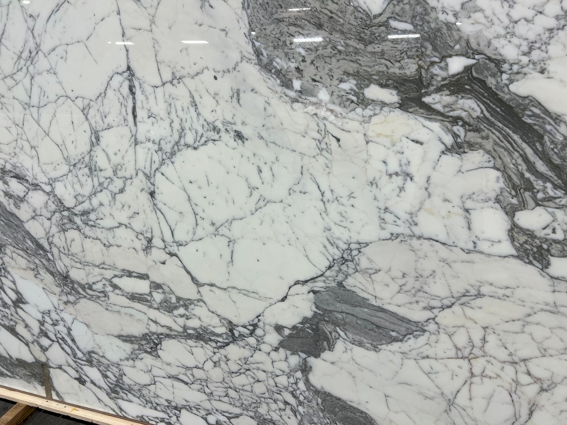 A close up of a white and gray quartzite slab.