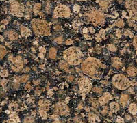 Brown granite with circular and irregular patterns.