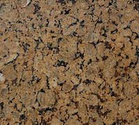 Brown granite countertop with speckled patterns.