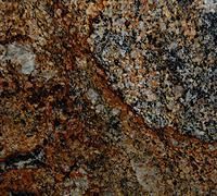 Brown, tan, and black granite with swirling patterns.
