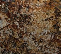 Close-up of granite countertop with brown, tan, and gray swirled patterns.