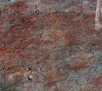 Red and gray granite stone surface with natural patterns.