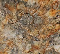 Abstract granite: swirling pattern in shades of gray, orange, and tan.