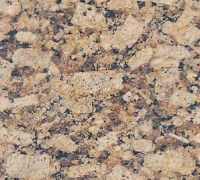 Close-up of granite surface with tan, brown, and black flecks.
