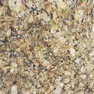 Close-up of granite surface with speckled patterns in shades of tan, beige, and black.