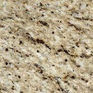 Tan granite with black and brown speckles and streaks.